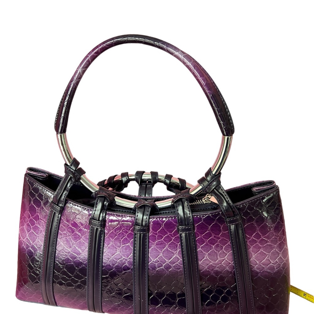 Purple handbag/purse and wallet.